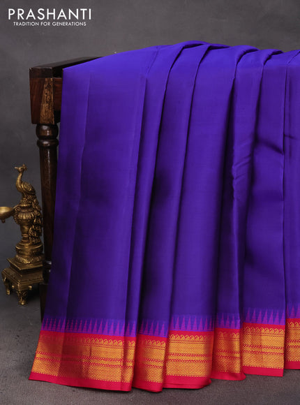 Pure kanchipuram silk saree blue and pink with plain body and temple deisgn zari woven border