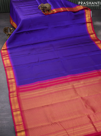 Pure kanchipuram silk saree blue and pink with plain body and temple deisgn zari woven border