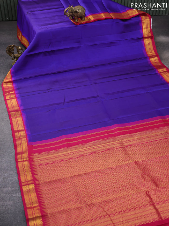 Pure kanchipuram silk saree blue and pink with plain body and temple deisgn zari woven border