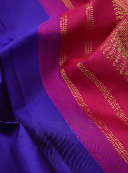 Pure kanchipuram silk saree blue and pink with plain body and temple deisgn zari woven border