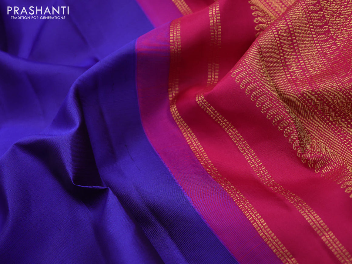 Pure kanchipuram silk saree blue and pink with plain body and temple deisgn zari woven border