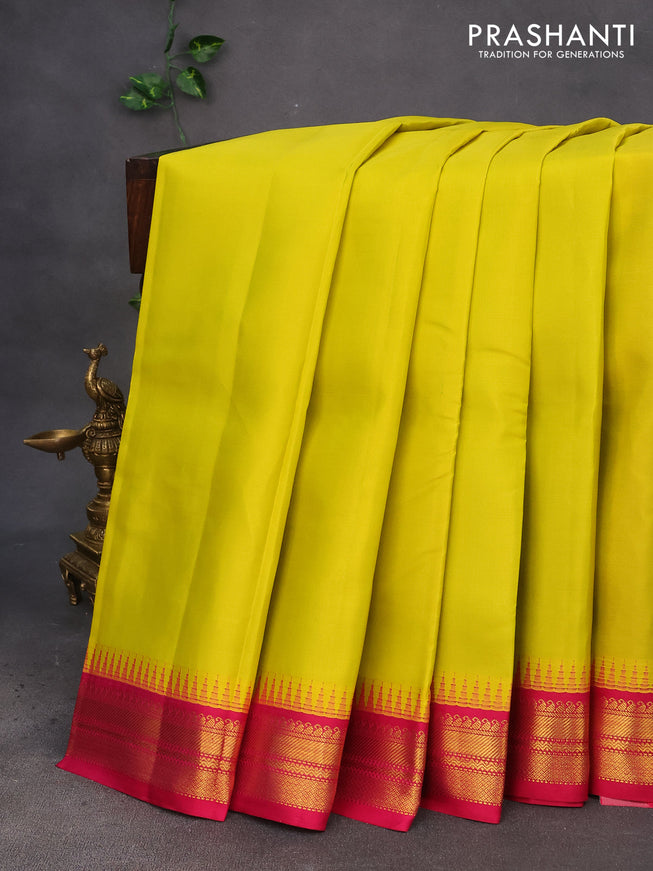 Pure kanchipuram silk saree lime yellow and pink with plain body and temple deisgn zari woven border