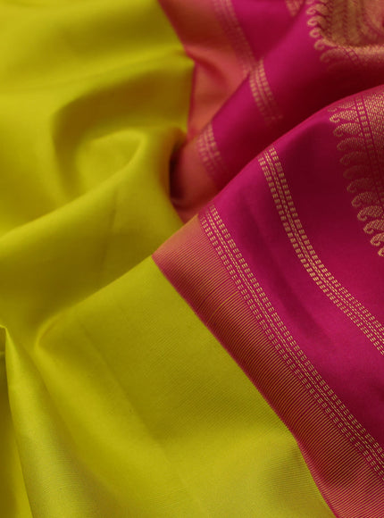 Pure kanchipuram silk saree lime yellow and pink with plain body and temple deisgn zari woven border