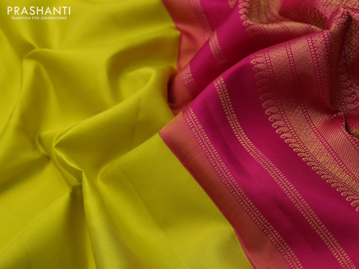 Pure kanchipuram silk saree lime yellow and pink with plain body and temple deisgn zari woven border