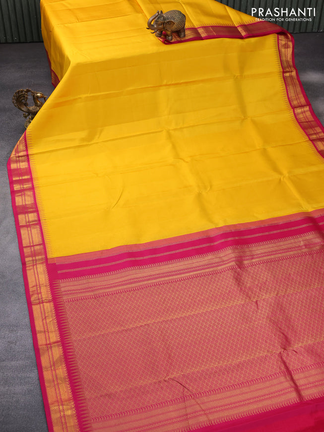 Pure kanchipuram silk saree mango yellow and pink with plain body and temple deisgn zari woven border