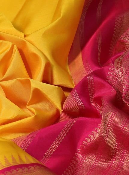 Pure kanchipuram silk saree mango yellow and pink with plain body and temple deisgn zari woven border