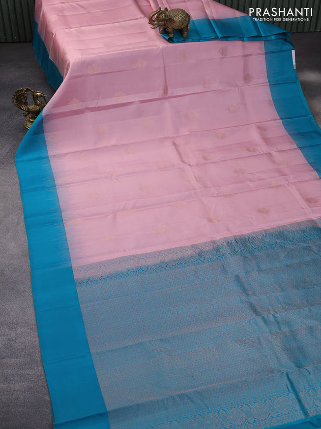 Pure kanchipuram silk saree pastel pink and teal blue with zari woven buttas and simple border