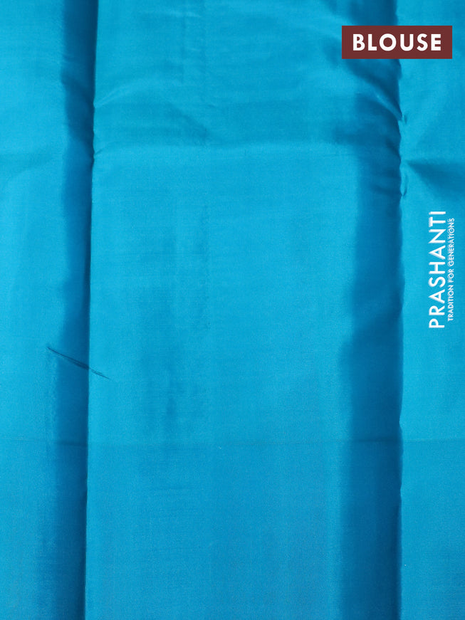 Pure kanchipuram silk saree pastel pink and teal blue with zari woven buttas and simple border