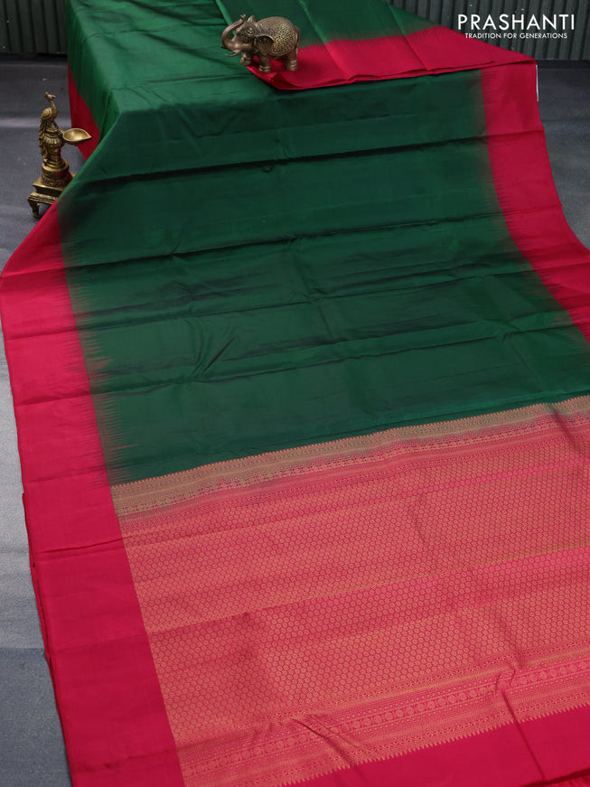 Pure kanchipuram silk saree dark green and dark pink with plain body and simple border