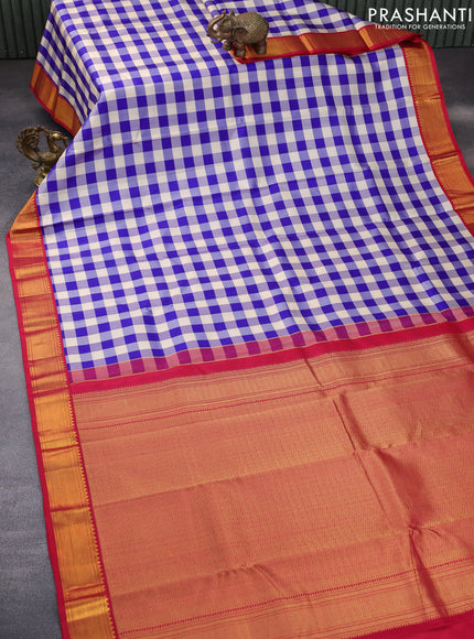 Pure kanchipuram silk saree cream blue and red with allover paalum pazhamum checks and zari woven korvai border