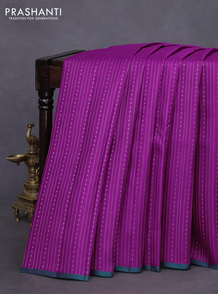 Pure kanchipuram silk saree purple and green with allover zari weaves and piping border