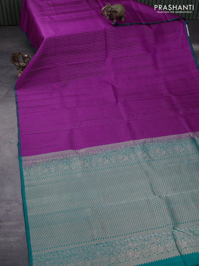 Pure kanchipuram silk saree purple and green with allover zari weaves and piping border