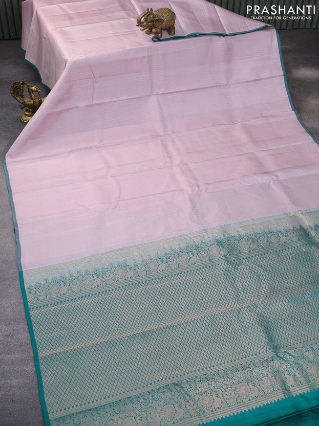 Pure kanchipuram silk saree pastel lavender shade and green with allover zari weaves and piping border