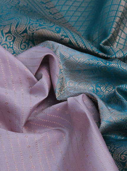 Pure kanchipuram silk saree pastel lavender shade and green with allover zari weaves and piping border