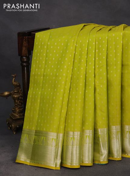 Pure kanchipuram silk saree lime yellow and teal blue with silver zari woven buttas and silver zari woven border