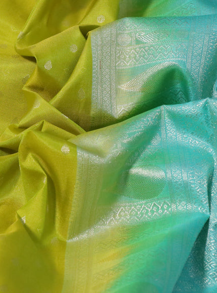 Pure kanchipuram silk saree lime yellow and teal blue with silver zari woven buttas and silver zari woven border