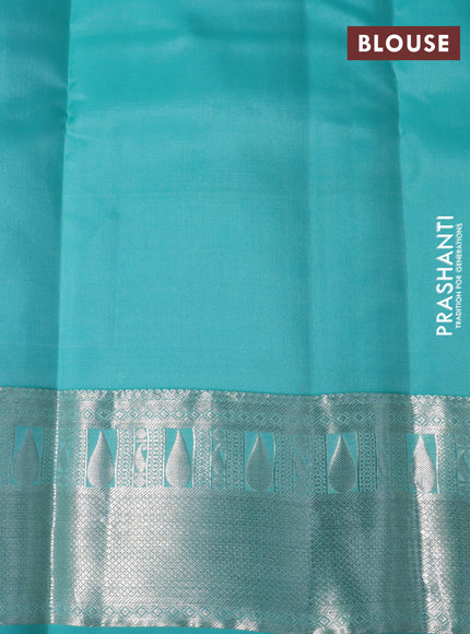 Pure kanchipuram silk saree lime yellow and teal blue with silver zari woven buttas and silver zari woven border