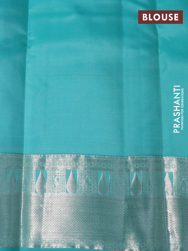 Pure kanchipuram silk saree lime yellow and teal blue with silver zari woven buttas and silver zari woven border