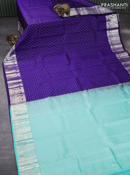 Pure kanchipuram silk saree blue and teal green with silver zari woven buttas and silver zari woven border