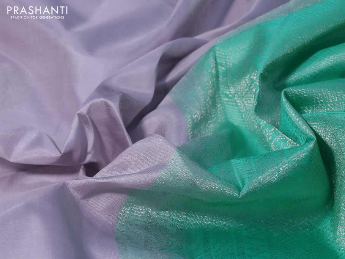 Pure kanchipuram silk saree pastel lavender shade and teal green with silver zari woven buttas and silver zari woven border