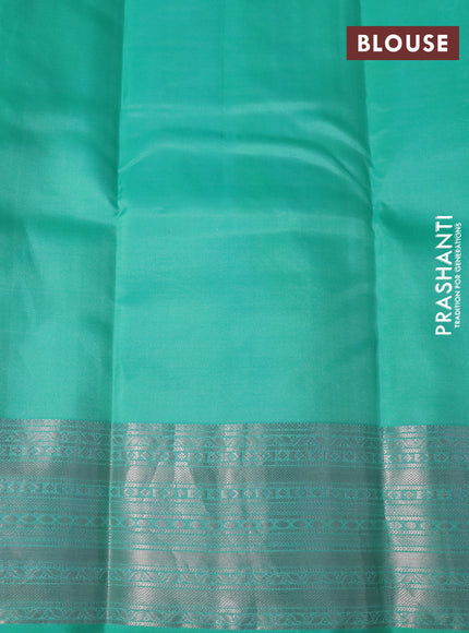 Pure kanchipuram silk saree pastel lavender shade and teal green with silver zari woven buttas and silver zari woven border