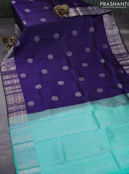 Pure kanchipuram silk saree dark blue and teal green with silver zari woven buttas and silver zari woven border