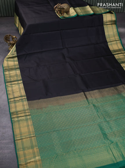 Pure kanchipuram silk saree black and green with plain body and rich zari woven border