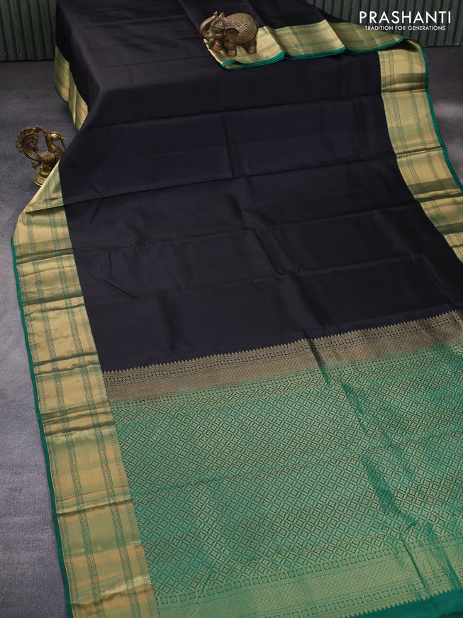 Pure kanchipuram silk saree black and green with plain body and rich zari woven border