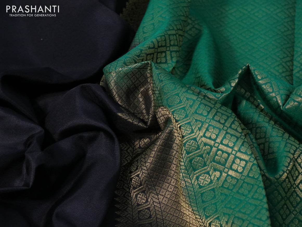 Pure kanchipuram silk saree black and green with plain body and rich zari woven border