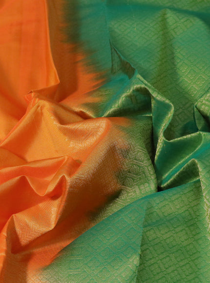 Pure kanchipuram silk saree dual shade of orange and green with plain body and rich zari woven border