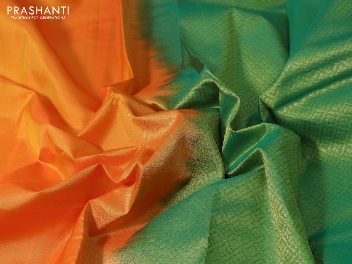 Pure kanchipuram silk saree dual shade of orange and green with plain body and rich zari woven border