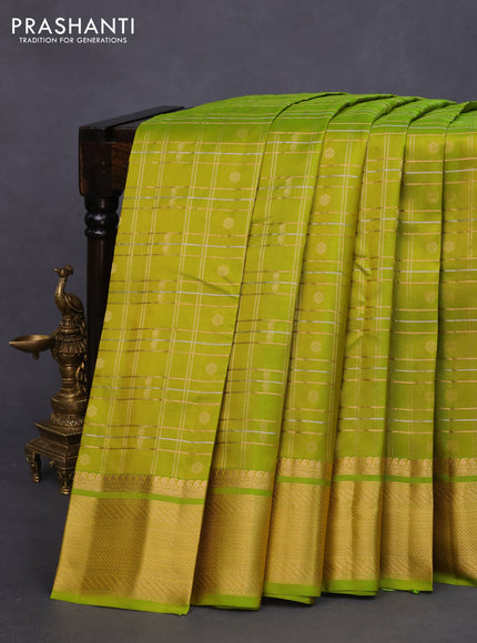 Pure kanchipuram silk saree light green with allover zari checks & buttas and rich zari woven border