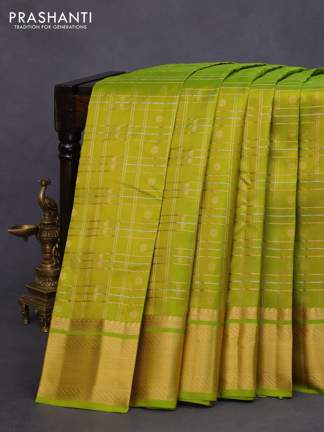 Pure kanchipuram silk saree light green with allover zari checks & buttas and rich zari woven border