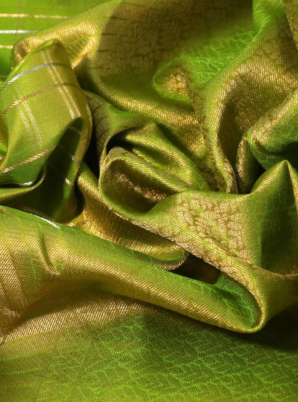 Pure kanchipuram silk saree light green with allover zari checks & buttas and rich zari woven border