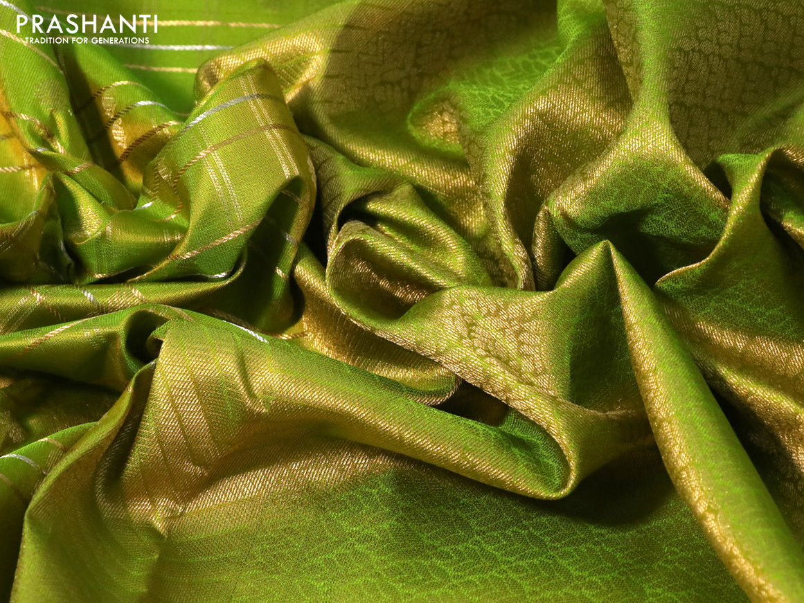 Pure kanchipuram silk saree light green with allover zari checks & buttas and rich zari woven border