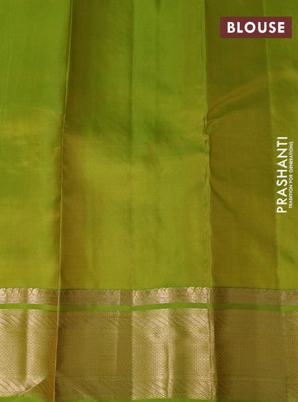 Pure kanchipuram silk saree light green with allover zari checks & buttas and rich zari woven border