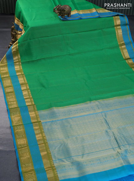 Pure kanchipuram silk saree green and blue with allover zari weaves and long rich zari woven border