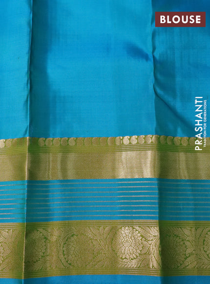 Pure kanchipuram silk saree green and blue with allover zari weaves and long rich zari woven border