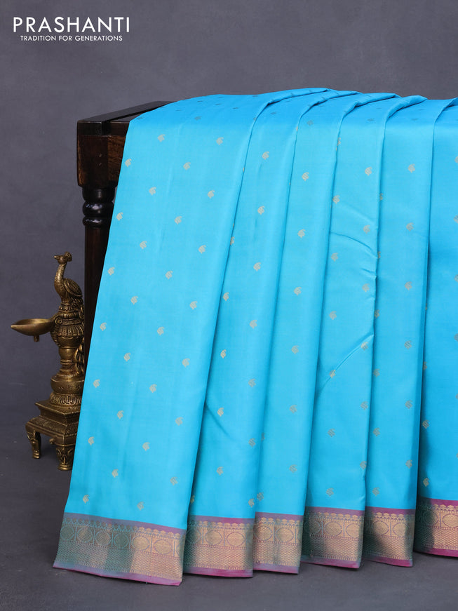 Pure kanchipuram silk saree light blue and dual shade of magenta pink with allover zari woven buttas and zari woven border