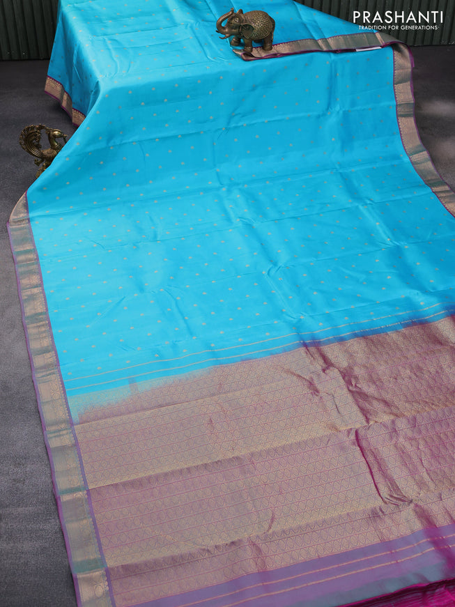 Pure kanchipuram silk saree light blue and dual shade of magenta pink with allover zari woven buttas and zari woven border