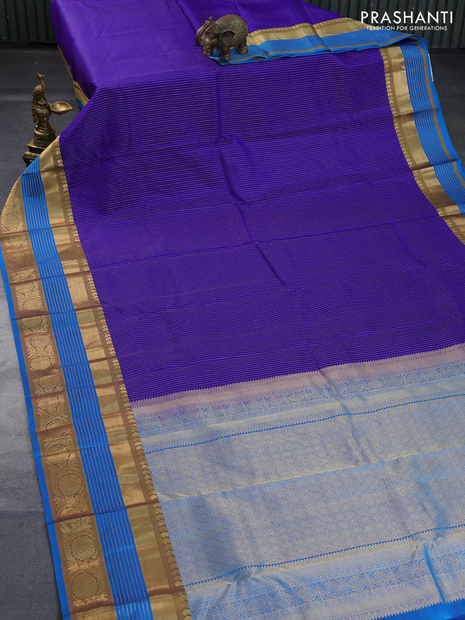 Pure kanchipuram silk saree blue and cs blue with allover zari weaves and long rich zari woven border