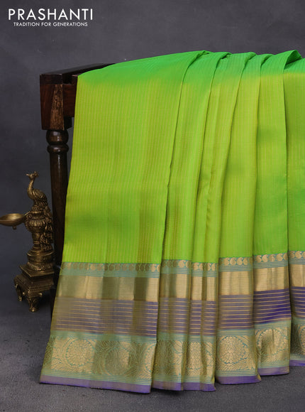 Pure kanchipuram silk saree light green and dual shade of blue with allover zari weaves and long rich zari woven border