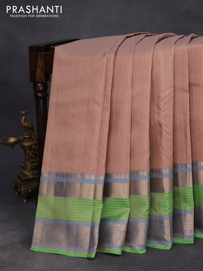 Pure kanchipuram silk saree beige and light green with allover zari weaves and long rich zari woven border