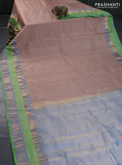 Pure kanchipuram silk saree beige and light green with allover zari weaves and long rich zari woven border