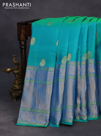 Pure kanchipuram silk saree dual shade of teal bluish green and blue with annam zari woven buttas and long annam zari woven border