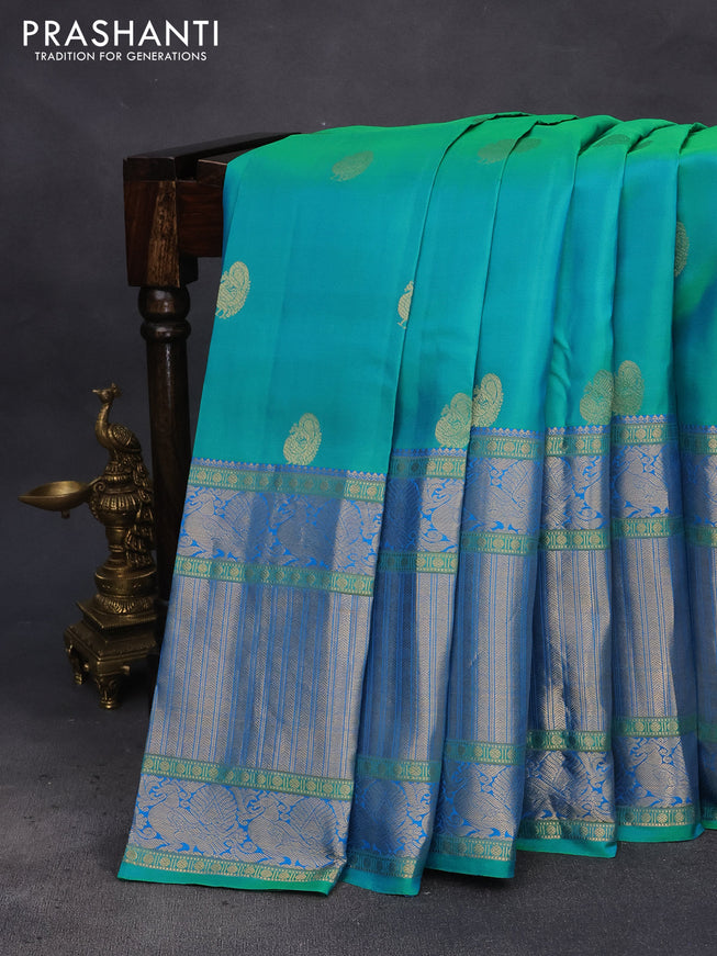 Pure kanchipuram silk saree dual shade of teal bluish green and blue with annam zari woven buttas and long annam zari woven border