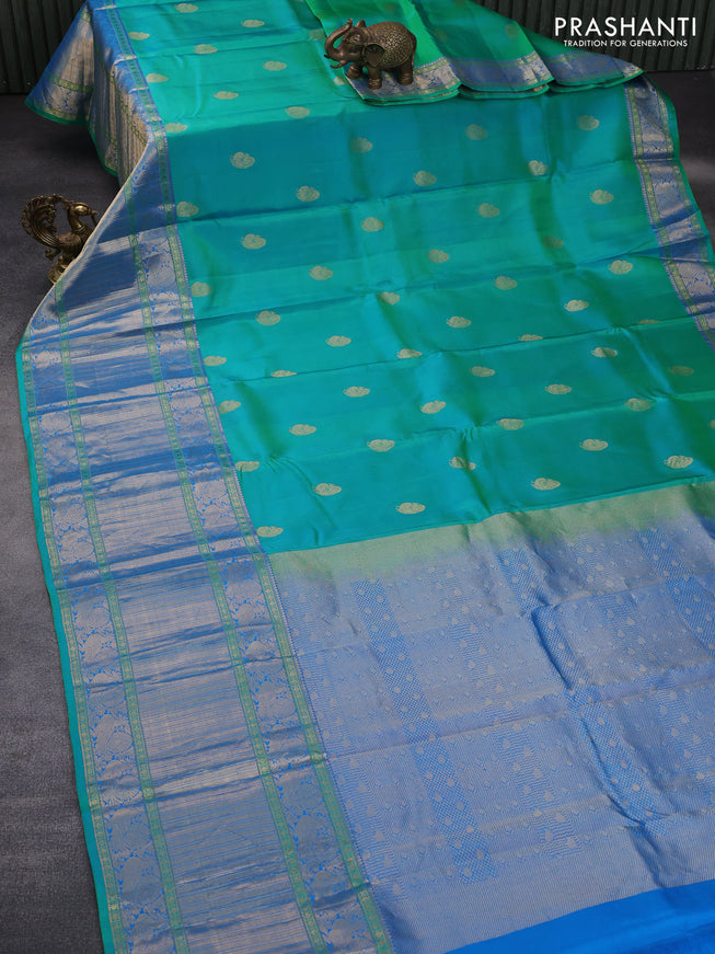 Pure kanchipuram silk saree dual shade of teal bluish green and blue with annam zari woven buttas and long annam zari woven border