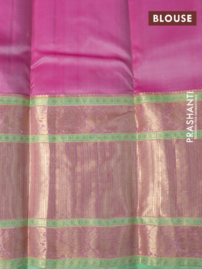 Pure kanchipuram silk saree mild peach and green with annam zari woven buttas and long annam zari woven border