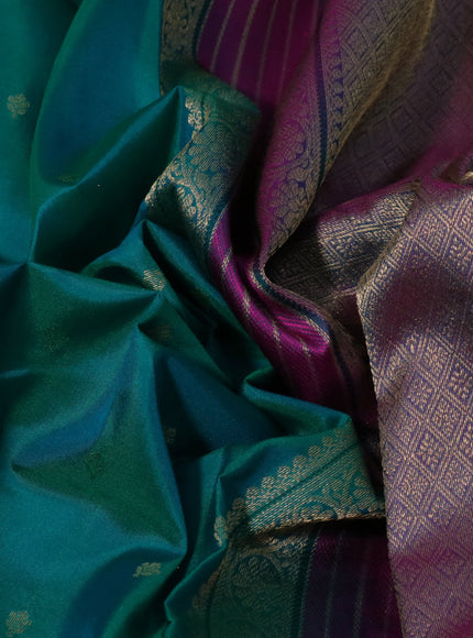 Pure kanchipuram silk saree dual shade of teal bluish green and pink with allover zari woven buttas and rich zari woven border