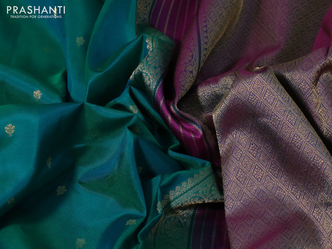 Pure kanchipuram silk saree dual shade of teal bluish green and pink with allover zari woven buttas and rich zari woven border